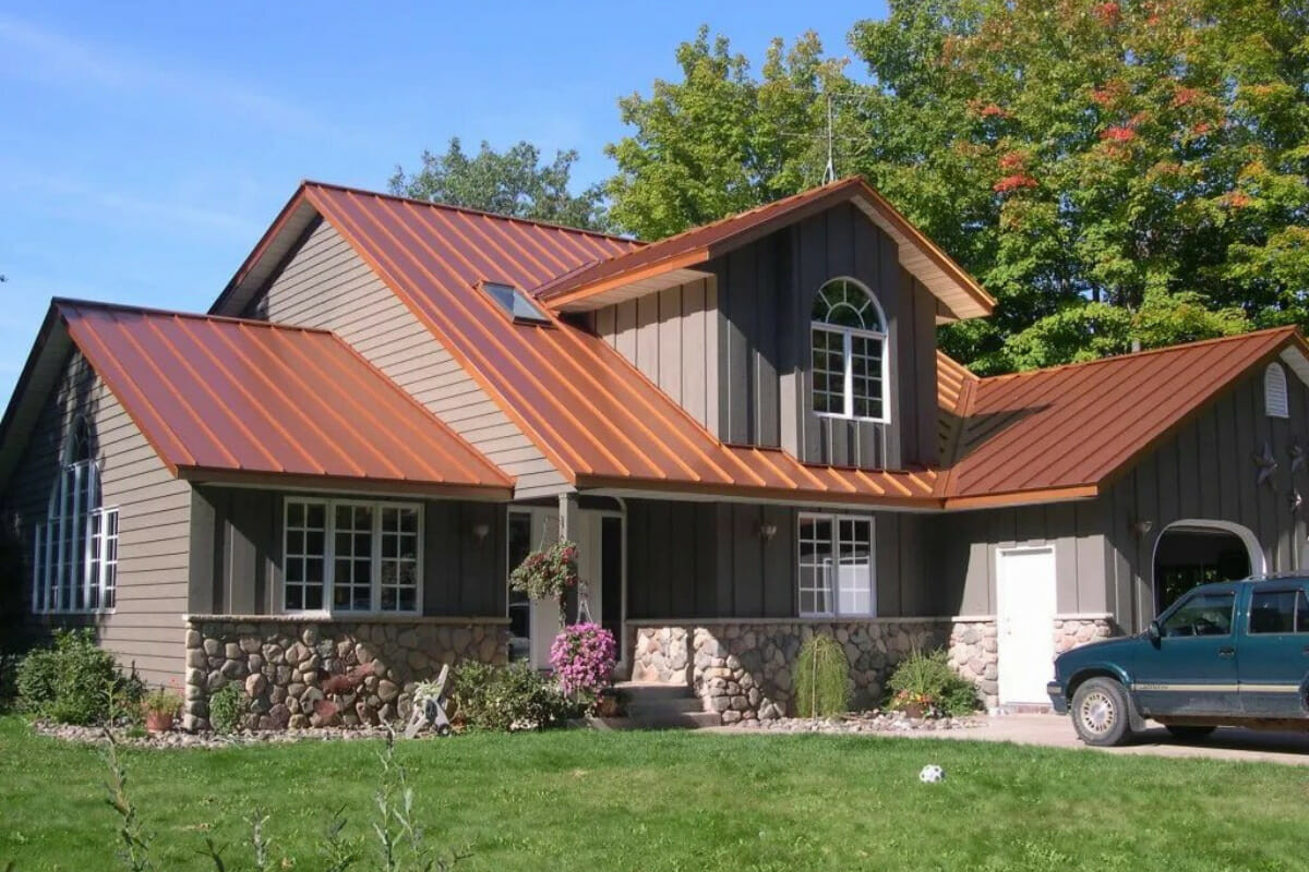Metal Roof And Siding Color Combinations Copper metal roof with a cream siding